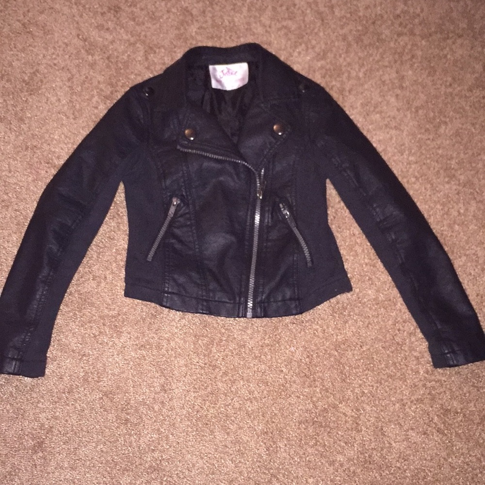 Justice, black leather jacket